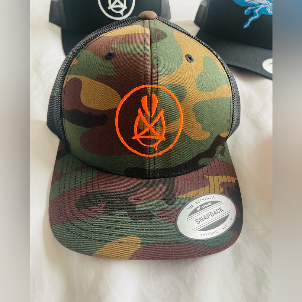 Graffiti Muralist Orange Tagged Camo Hat